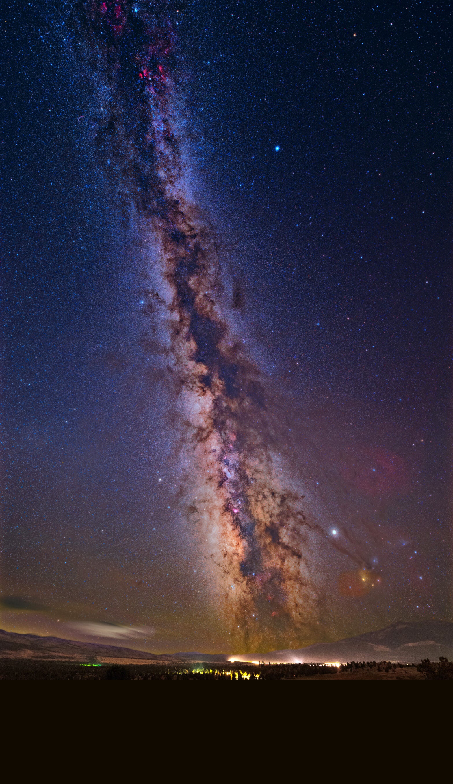 The summer Milky Way was photographed from a hilltop over the Modoc Plateau in California using ten 3-minute exposures and a Sigma Art 14mm lens. All photos were taken with a Nikon D750 DSLR, pre-processed in Adobe Bridge, and post-processed in Adobe Photoshop.