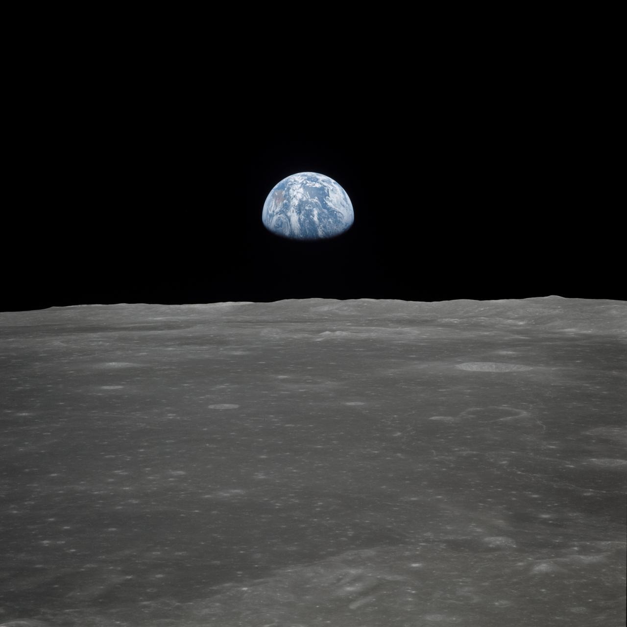 This view of Earth rising over the Moon's horizon was taken from the Apollo 11 spacecraft. Credit: NASA.