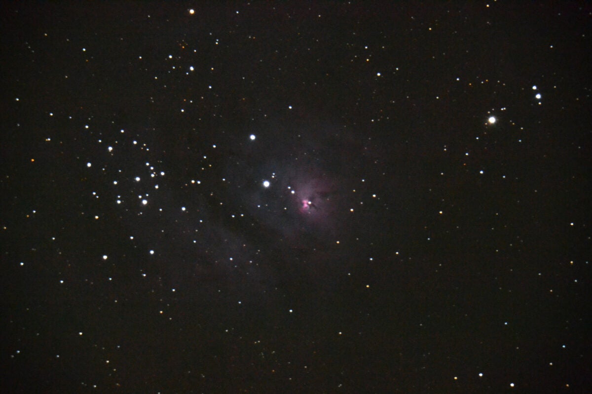 My first image of the Lagoon Nebula (M8) was so magnified that the object didn't look like a lagoon at all. I took it with a Nikon D3100 on my 8-inch Celestron SCT, with an exposure time of 30 seconds at ISO 3200.