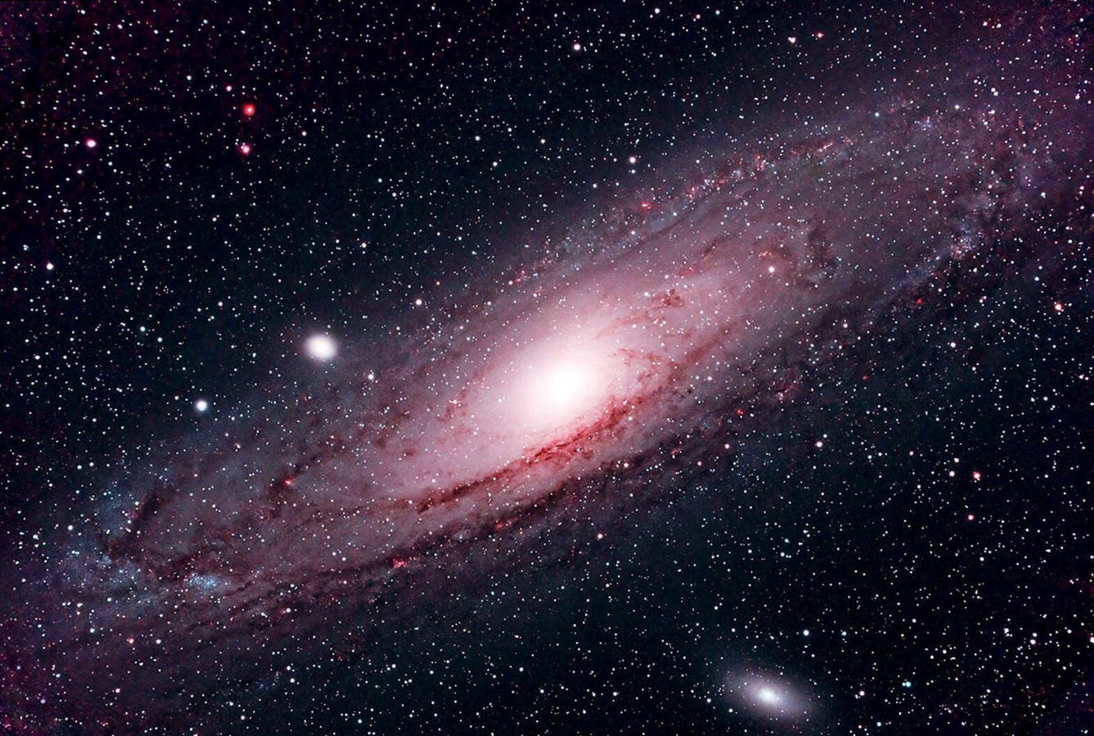 The author took this digital color image of the Andromeda Galaxy and its two main satellites with a 5-inch apochromatic refractor, Canon R mirrorless camera, and IDAS LPS 4 filter. The total exposure time was 18 minutes at ISO 4000.