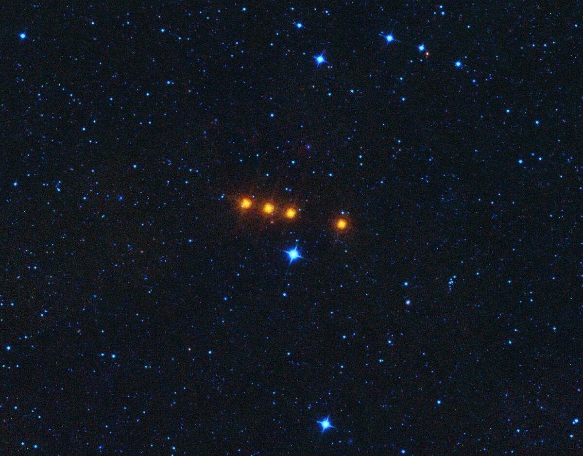 The asteroid Euphrosyne glides across a star field in this time-lapse image taken by NASA's WISE spacecraft. WISE acquired the images used to create this image over a period of about a day, around May 17, 2010, during which time it observed the asteroid four times.