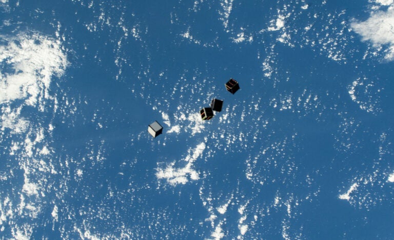 Tiny satellites, also known as CubeSats, are pictured after being deployed into Earth orbit from a small satellite orbital deployer on the outside of the International Space Station's Kibo laboratory module. The CubeSats were delivered aboard the Northrop Grumman Cygnus space freighter and will serve a variety of educational and research purposes for public and private organizations around the world.