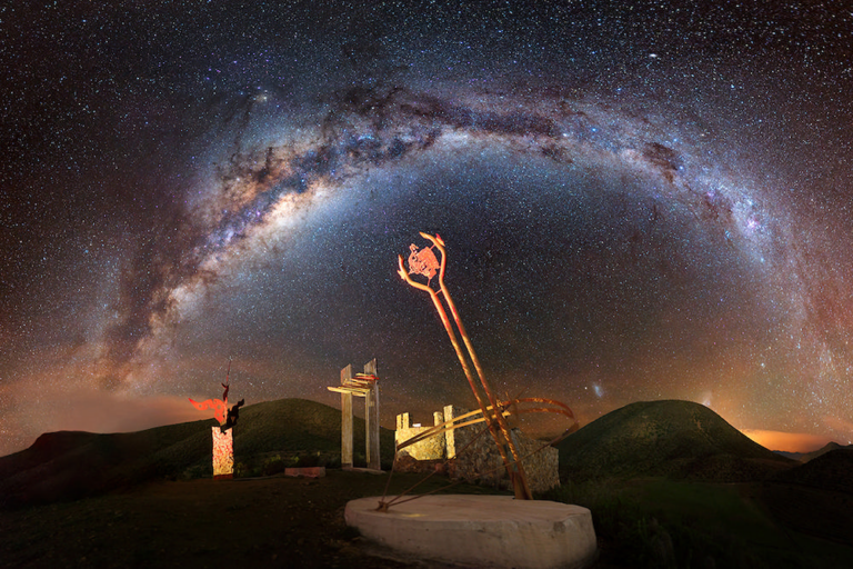 Night sky over a sculpture at Observatorio Cerro Mayu