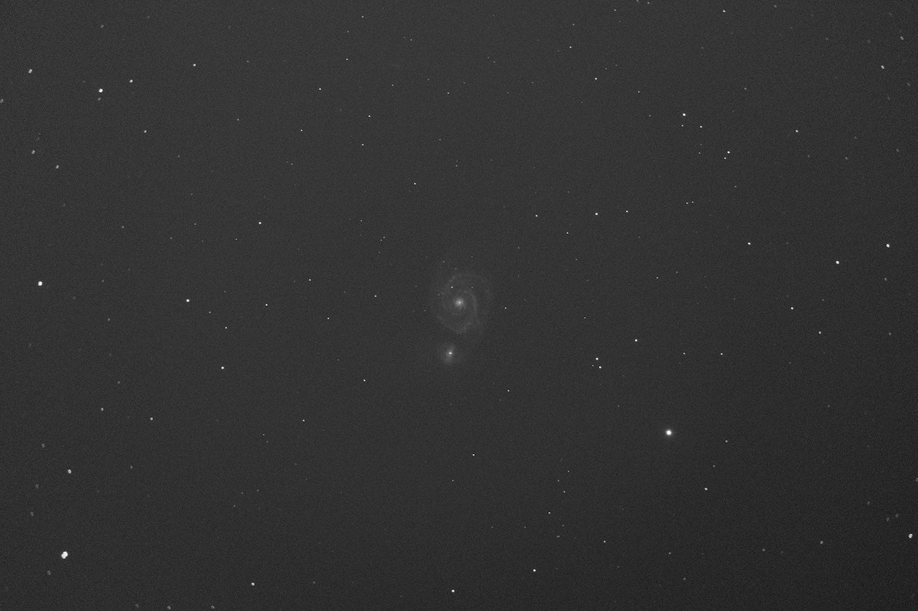 The image of M51 properly calibrated with flats and darks.