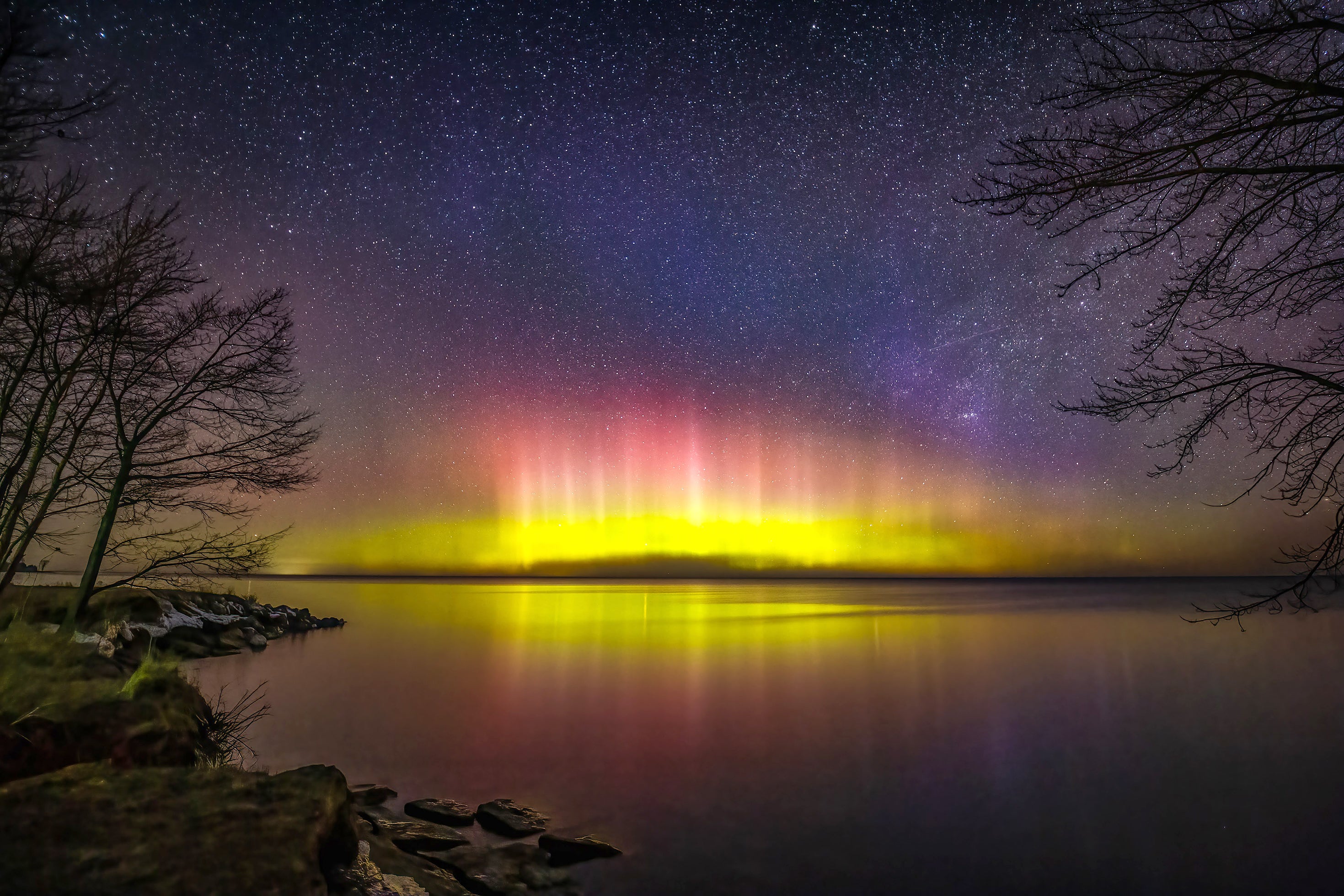 The glow of the aurora borealis dazzles over Lake Huron in this shot taken from Pointe aux Barques Lighthouse park. This shot is a single 30-second exposure taken with a Tamron 17–35mm zoom lens at 17mm and f/2.8 and ISO 6400.